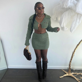 Two piece set of metal buckle lapel top and half skirt