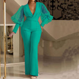 Wrinkled V-neck mesh spliced long sleeved jumpsuit