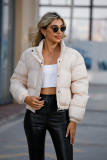 Short cotton jacket with loose long sleeves and high neck for warmth