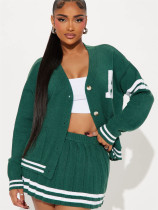 Versatile knitted loose long sleeved cardigan and pleated short skirt set