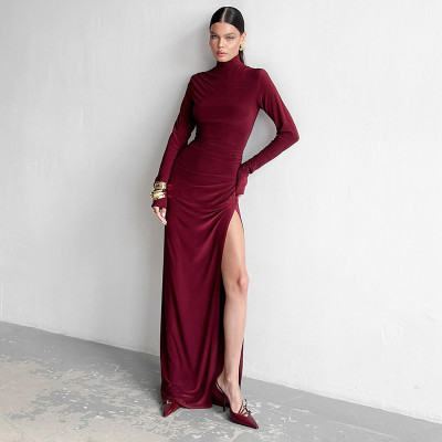 High neck long sleeved high waisted pleated slit long dress