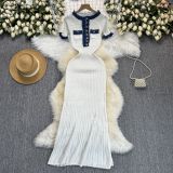 Color blocking round neck metal buckle knitted short sleeved dress