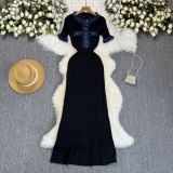 Color blocking round neck metal buckle knitted short sleeved dress