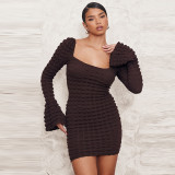 Bubble cloth hollow chest wrapped trumpet long sleeved dress