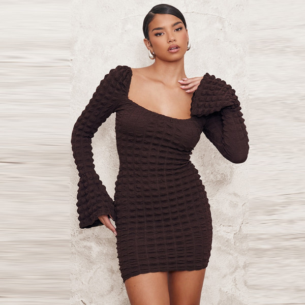 Bubble cloth hollow chest wrapped trumpet long sleeved dress