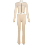 Open navel long sleeved top and pants two-piece set