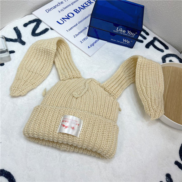 Long ear knitted yarn cap for warmth and thick knitted yarn cap