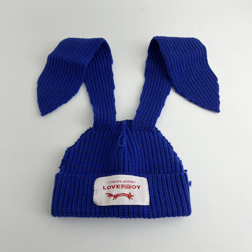 Long ear knitted yarn cap for warmth and thick knitted yarn cap