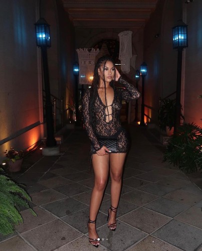 Solid color lace jumpsuit with low neckline and hollowed out long sleeved dress