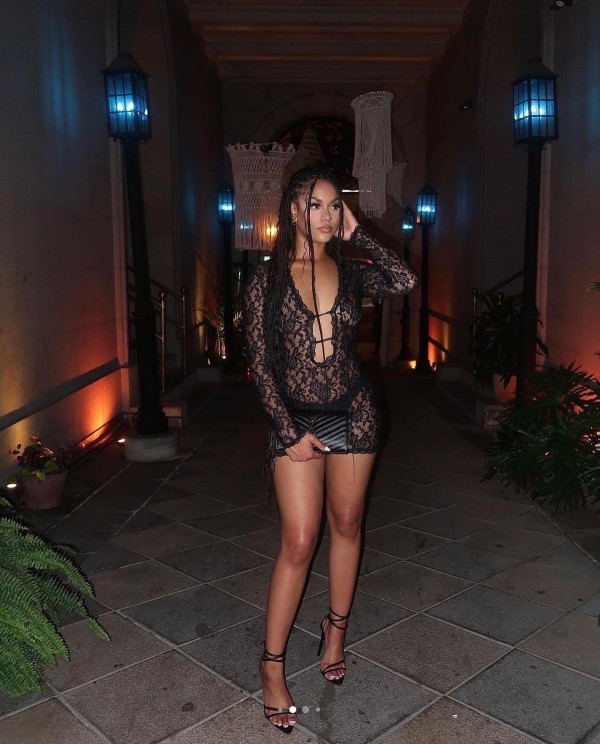 Solid color lace jumpsuit with low neckline and hollowed out long sleeved dress