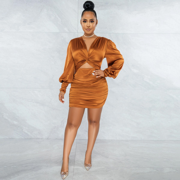 Solid color long sleeved hollow pleated mid skirt dress