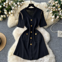 Knitted dress with metal breasted V-neck and waist cinched mid length design