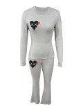 Printed long sleeved round neck T-shirt and pants set