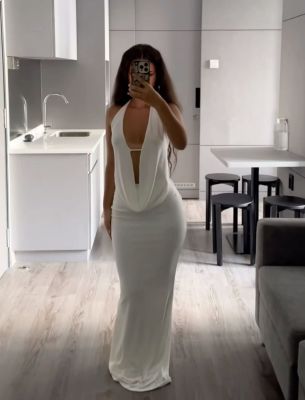 Two piece set of white top and long skirt