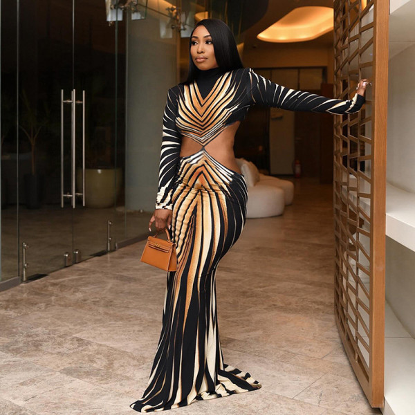 Half high neck digital printed waist revealing dress