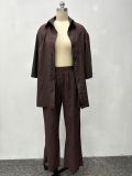 A two-piece shirt with three quarter sleeves, a top, and pants