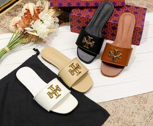 A pair of sheepskin slippers with a simple flat bottom on top