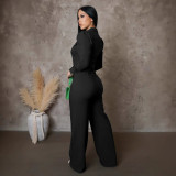 Spliced long sleeved sports jumpsuit