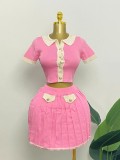 Women's knitted cardigan and skirt