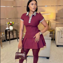 Waist hugging contrasting ribbed wide pleated dress