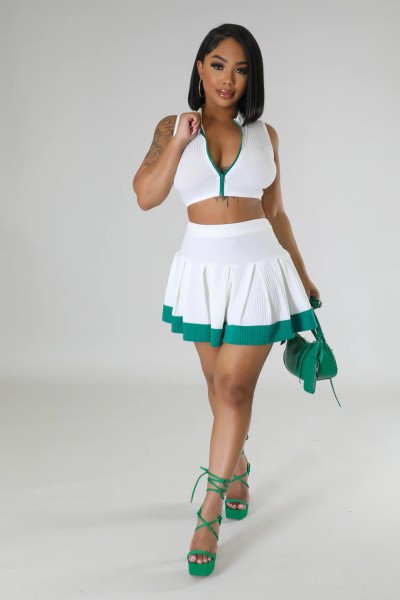 Two piece set of sleeveless cardigan, vest, exposed navel skirt