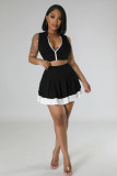 Two piece set of sleeveless cardigan, vest, exposed navel skirt