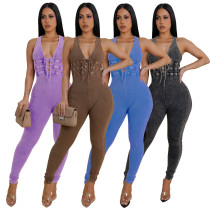 Water washed distressed tight pants with sleeveless threaded jumpsuit