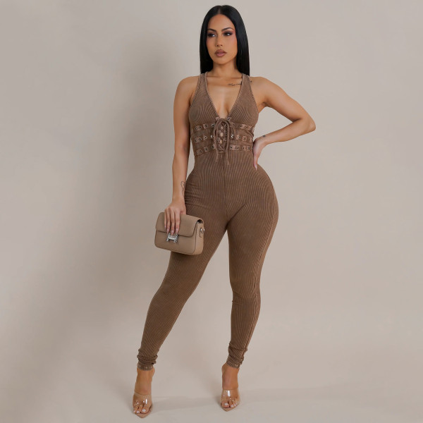 Water washed distressed tight pants with sleeveless threaded jumpsuit