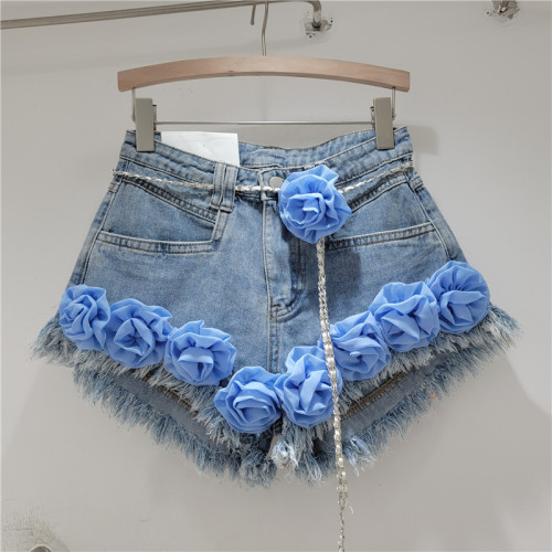 Colorful flower decorated fringed denim shorts