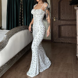 Small floral suspender dress with large swing skirt