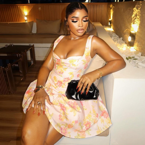 Backless printed A-line dress with camisole and waist cinching for a shorter look