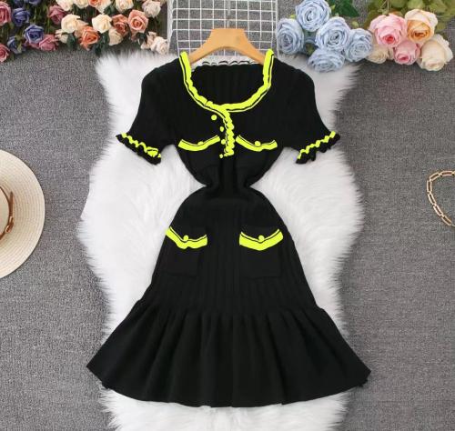 French ruffled short sleeved knitted dress with buttons and fake pockets