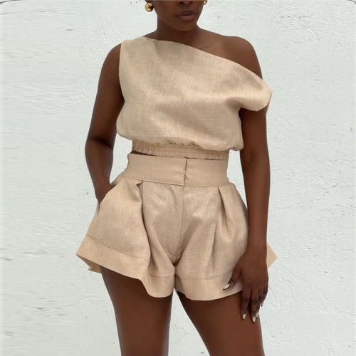 Two piece set of high waisted wide leg shorts with a one collar off the shoulder shirt