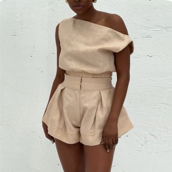 Two piece set of high waisted wide leg shorts with a one collar off the shoulder shirt