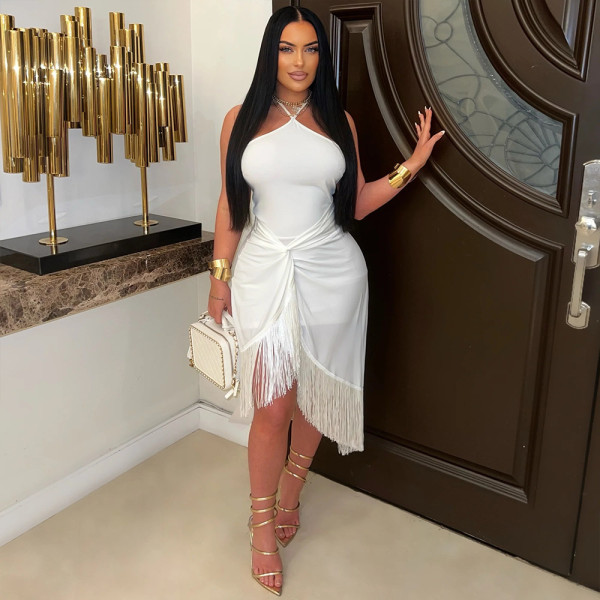 Sleeveless lace up tight fitting hip hugging fringe jumpsuit
