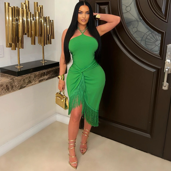 Sleeveless lace up tight fitting hip hugging fringe jumpsuit