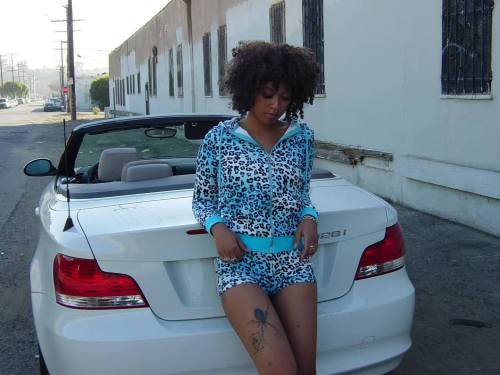 Leopard print hooded sweatshirt set with exposed navel