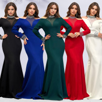 Solid color dress with wrapped arms and rhinestones Solid color dress with wrapped arms and rhinestones