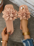 Wearing flat sandals over oversized slippers