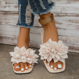Wearing flat sandals over oversized slippers
