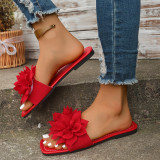 Wearing flat sandals over oversized slippers
