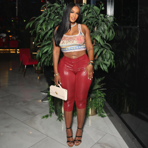 Tight solid color snake patterned cropped pants