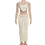 Hollow out camisole vest, hip hugging skirt, knitted set
