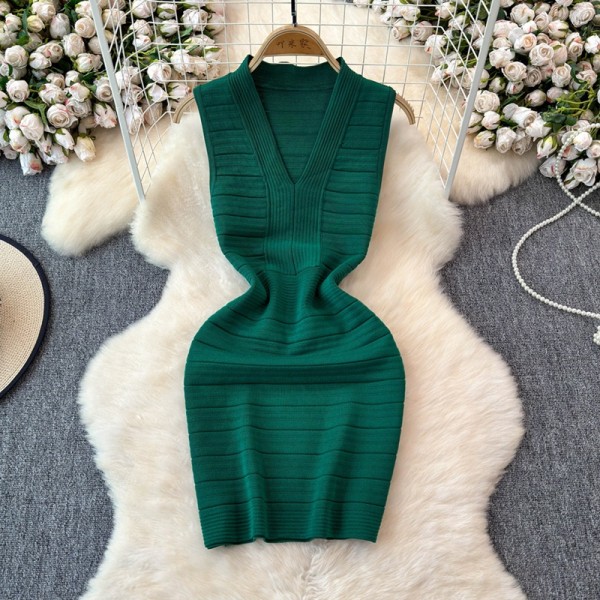 V-neck waist cinched sleeveless knit hip hugging jumpsuit