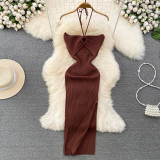 Hanging neck hollow backless sleeveless mid length slit hip hugging knitted dress