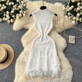 Sleeveless knitted fringed dress
