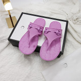 Jelly colored flip flops