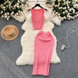 Short vest top paired with high waisted half body knitted skirt two-piece set