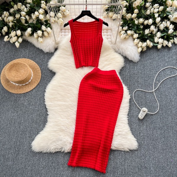 Short vest top paired with high waisted half body knitted skirt two-piece set