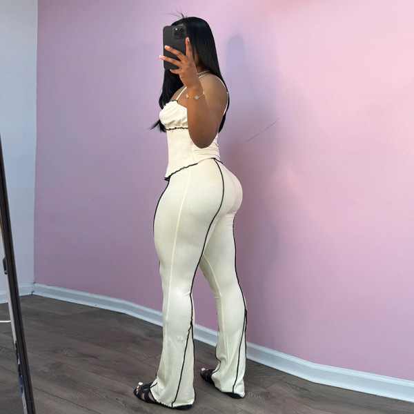 Two piece set of camisole, tank top, slim fit pants